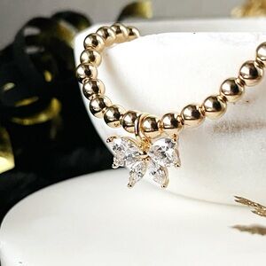 Park Lane Gold “Twinklebow” Bracelet